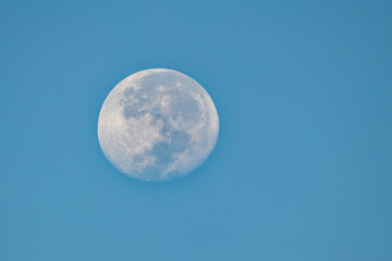 Naklejka na ściany i meble view of full moon and blue sky