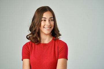 cheerful brunette in red t-shirt cropped view fashion teen