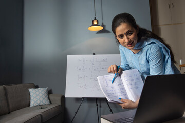 A woman teaching in an online class.