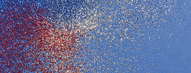 Abstract patriotic red white and blue glitter sparkle background for 4th of July Memorial, Labor, Independence, Presidents and Veteran's Day. Banner. Flat lay. Copy space.