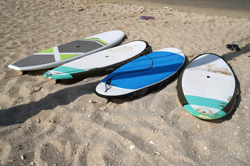 Many surfboard on the sand beach at paradise beach phuket thailand