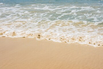 Sand, sea and sea wave background for use as graphical element