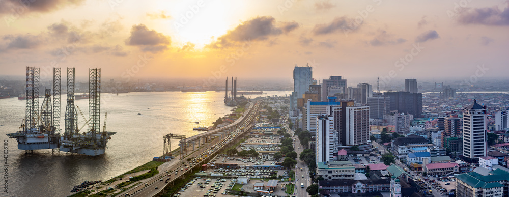 Wall mural a panorama shot of cityscape of lagos island, nigeria at sunset