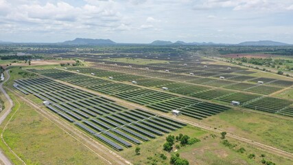 Fototapeta na wymiar Solar energy farm. Aerial view of a solar farm in Asia.