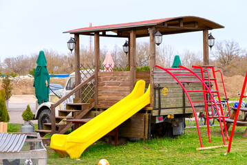 Empty children's playground made from old Soviet car Gaz in Estonia