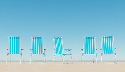 chairs on sandy beach near sea
