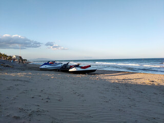 sea ​​beach and motor boats on it