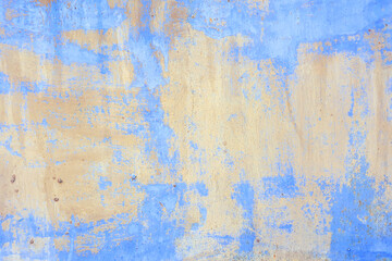 Blue and white painted wall background, texture. Concrete structure closeup. Texture of rough stucco wall.
