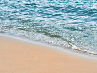 Beach sand sea water summer background.