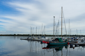Fototapeta premium Tiny boats in the river Unterwarnow in the german city Rostock
