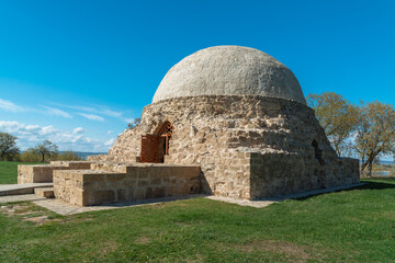 View of the Northern Mausoleum-a preserved monument of the XIV century-on the territory of the Bolgar Historical and Architectural Museum-Reserve on a sunny spring day. Bolgar, Tatarstan, Russia