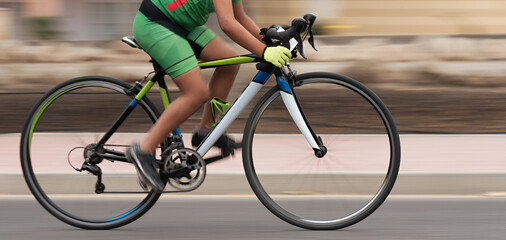 Cycling rider competing in the youth class, motion blur of a bike race with the bicycle and rider...