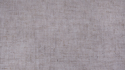 Beige fabric background close-up