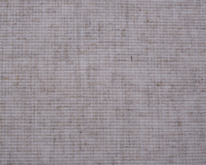 Beige fabric background close-up