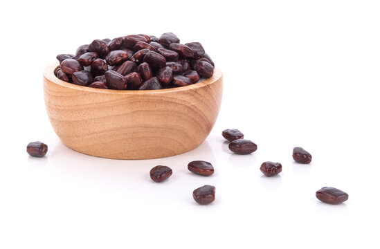 Tamarindus indica seed isolated on white background