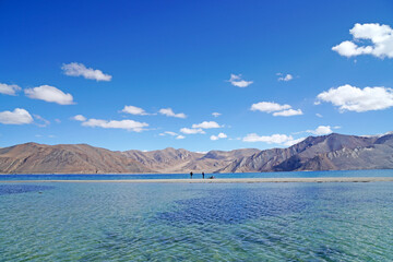 Landscape Nature Scene of Pangong tso or Pangong blue Lake with Himalaya Snow mountain background at Leh Ladakh ,Jammu and Kashmir , India  - unseen travel vacation park and outdoor