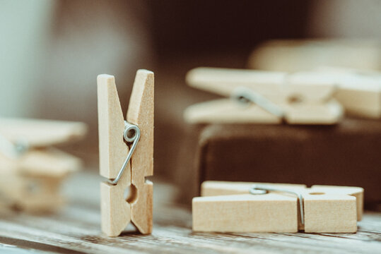 Close-up of wooden clothes pegs on a table