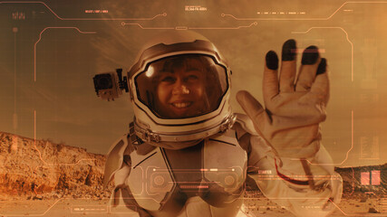 Female astronaut recording video diary on Mars © Framestock
