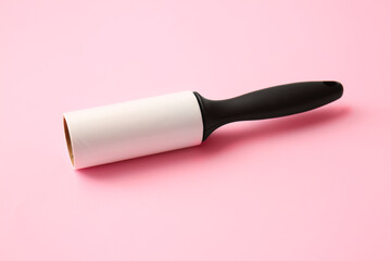Lint roller on color background