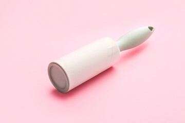 Lint roller on color background
