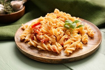 Plate with healthy pasta on table