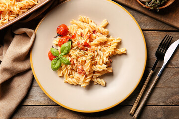 Plate with healthy pasta on table