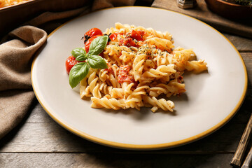 Plate with healthy pasta on table