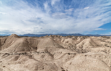 Fototapeta na wymiar Sand dunes against a beautiful blue sky