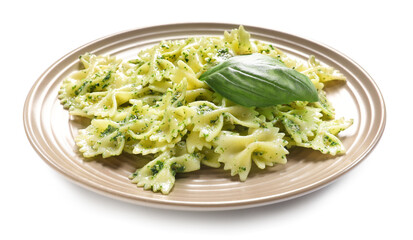 Plate with tasty pesto pasta on white background