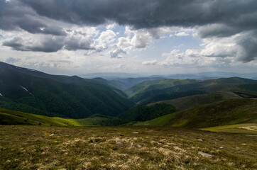 Mountain panoramic landscape with clouds and blue sky