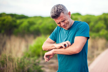 Allergy or mosquito bite. Man scratcing arm. Healthcare and medicine concept