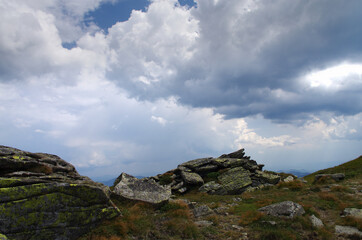 Mountain panoramic landscape with clouds and blue sky