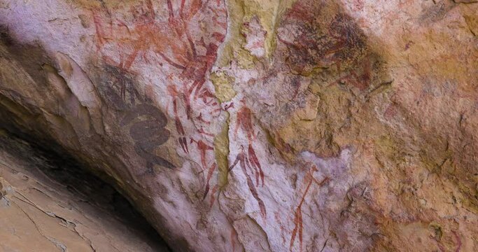 Panning view of well preserved San bushman paintings in the Main caves at Giants Castle,Drakensberg, KwaZulu-Natal,South Africa
