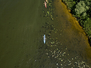 Kayak on the river in summer. Aerial drone view.