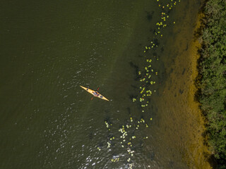Kayak on the river in summer. Aerial drone view.