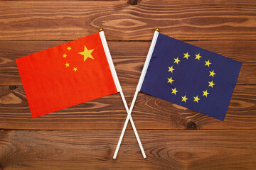Flag of China and flag of * crossed with each other. The image illustrates the relationship between...