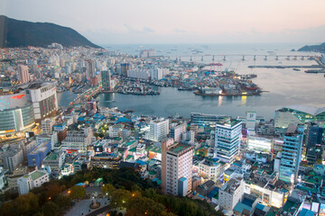 A panoramic view from Busan Tower overlooks the Busan city and the Busan harbor.