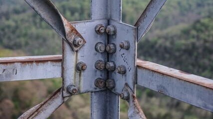 Metal stairs in a tower against a blue sky