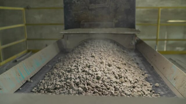 Cement additives at the plant. Raw materials of a cement plant on a conveyor belt.