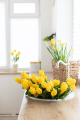 Kitchen interior with a fresh bouquet of tulips.