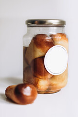 Traditional neapolitan dessert baba with rum in decorative jars