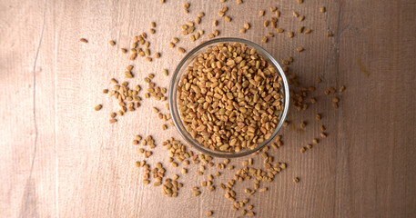 Organic fenugreek seeds, ingredient in Indian cuisine.