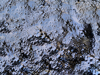Boiling hot bubbling pitch asphalt surface texture 