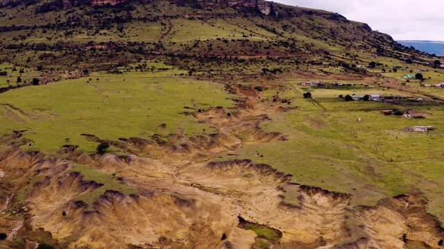 Aerial view of land destroyed by soil erosion from bad agriculture practices. Climate change and global warming