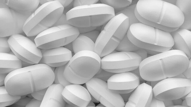 White falling 3D pills pouring a screen isolated on a black background with luma matte. Tablets filling a screen.