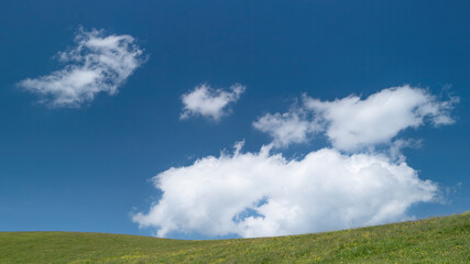 Green hills, blue sky and clouds, Italy landscape
