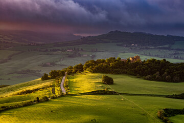 VAL D'ORCIA, TUSCANY, ITALY - MAY 18 : Incoming storm approaching Val d'Orcia in Tuscany Italy on...