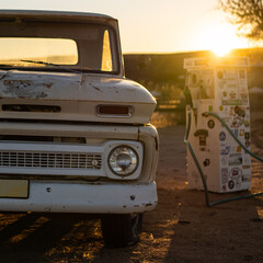 old rusty car sunset