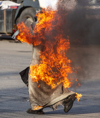 The man burns with a flame of fire.