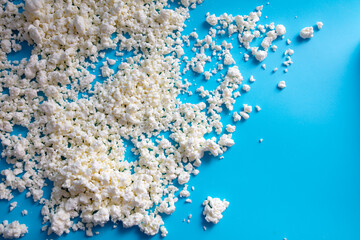 Milk curd on a blue background.